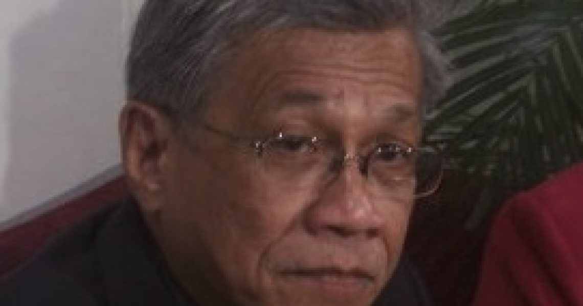 Portrait of Walden Bello wearing glasses and seated indoors during an interview or discussion.